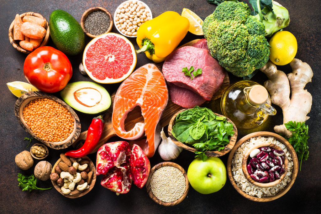 A table filled with all the foods that make up a balanced and nutritious diet