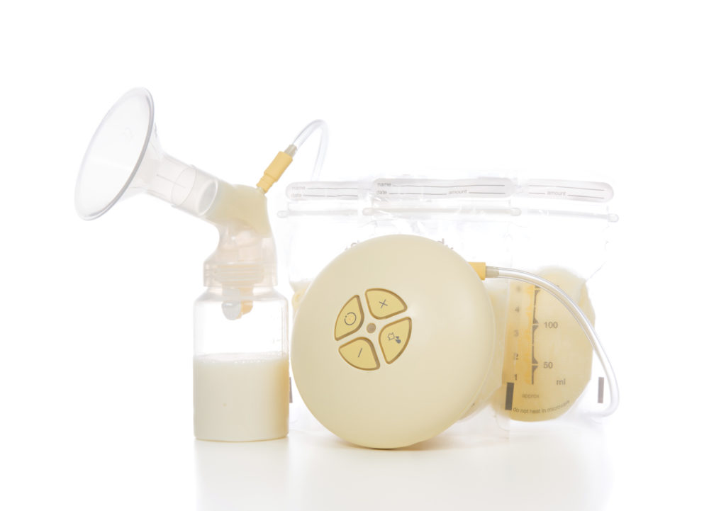 Closeup of a a breast pump filled with breastmilk