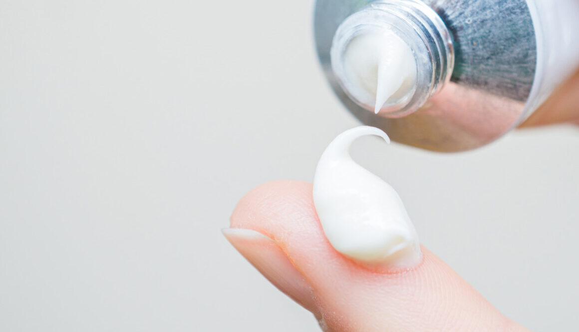 Closeup of a Woman Applying Vaginal Estrogen Cream on Her Finger